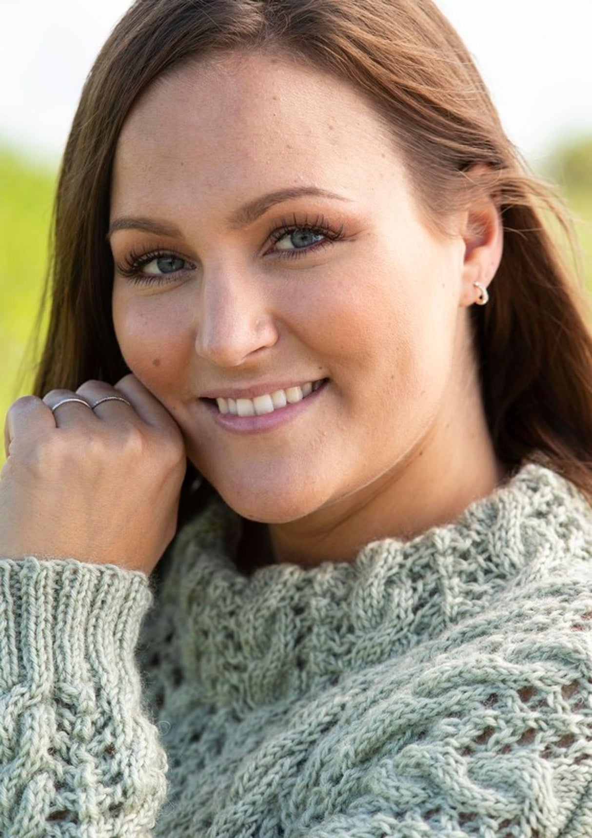 Sweater with lace pattern and cables