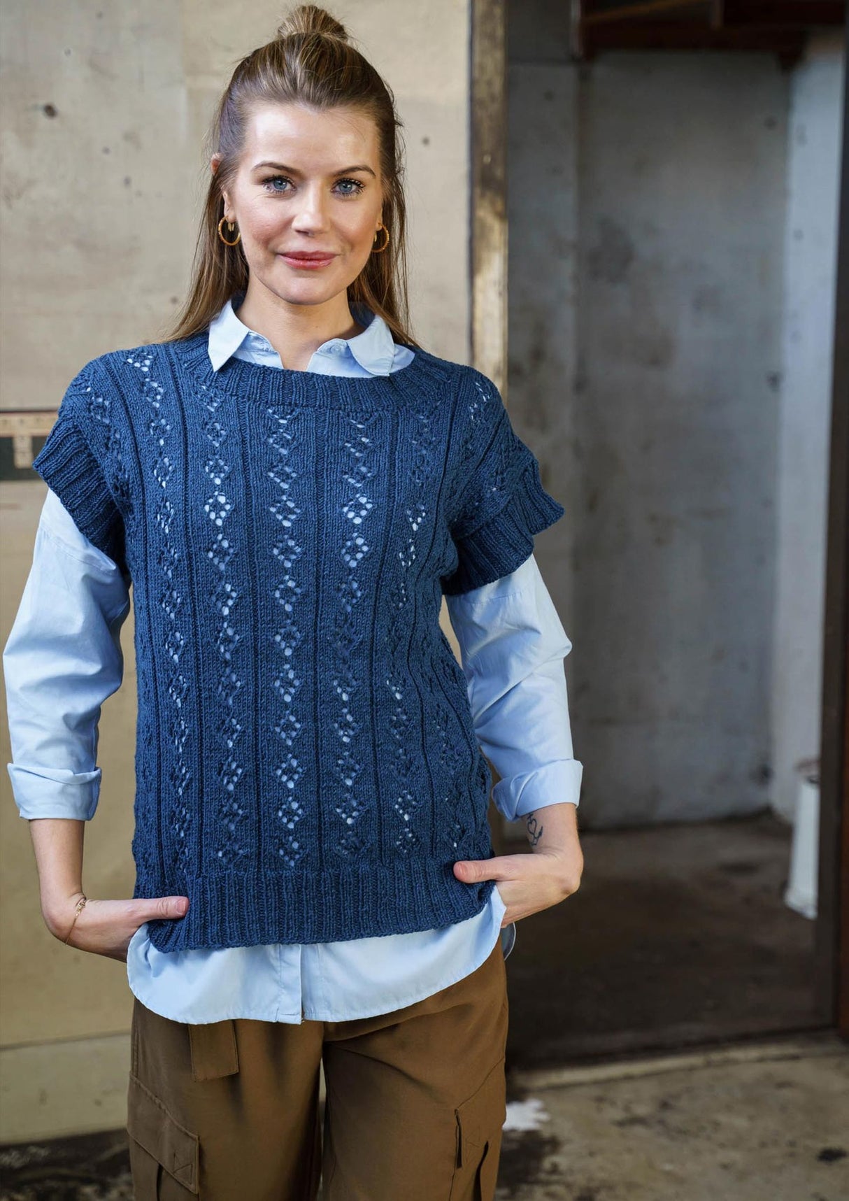 Vest with eyelet pattern