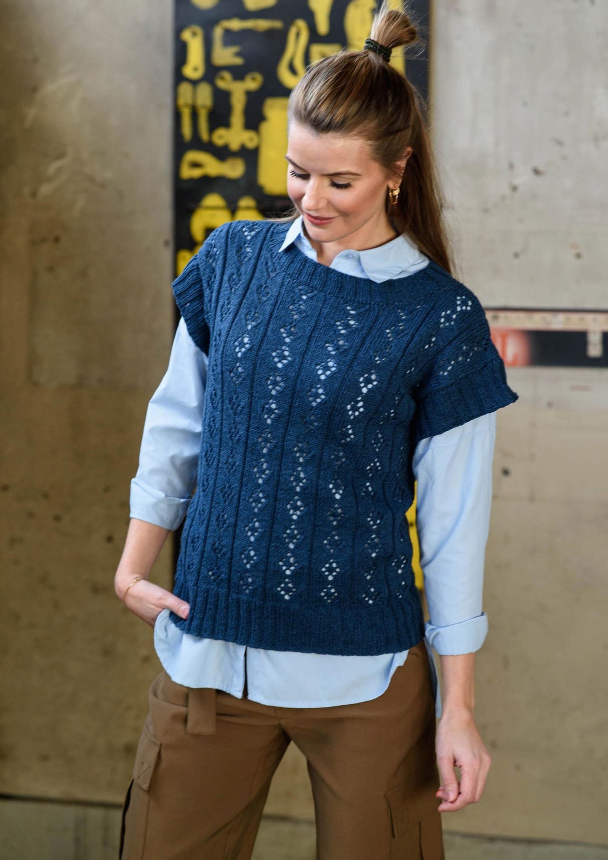 Vest with eyelet pattern