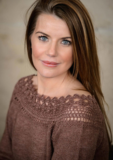 Knitted blouse with crocheted yoke