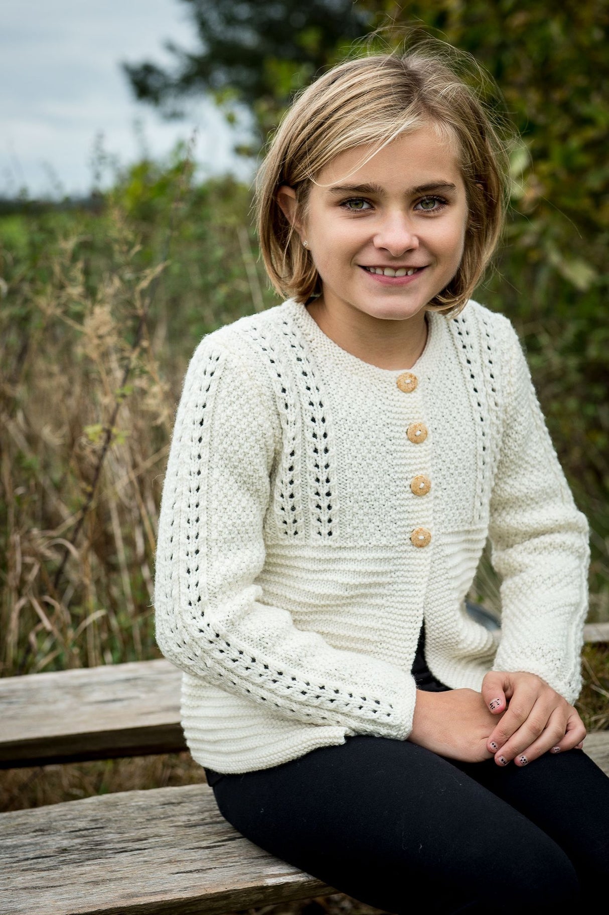 Girl's sweater with lace pattern