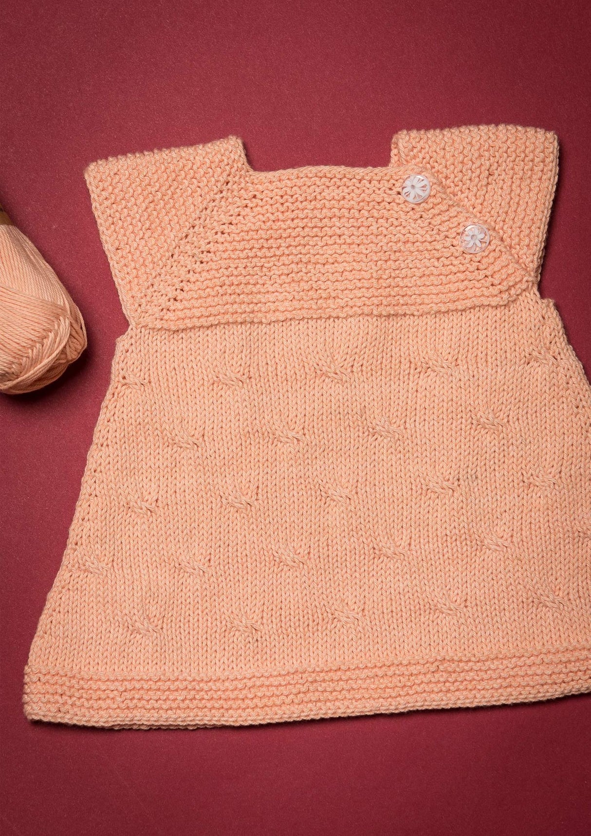 Knitted tunic for baby