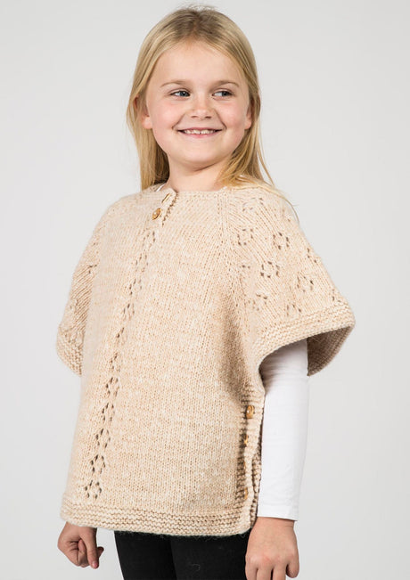 Poncho with eyelet pattern 