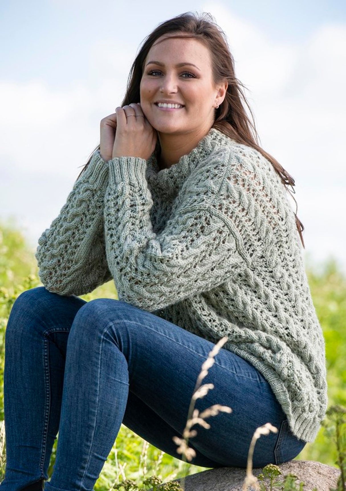 Sweater with lace pattern and cables 