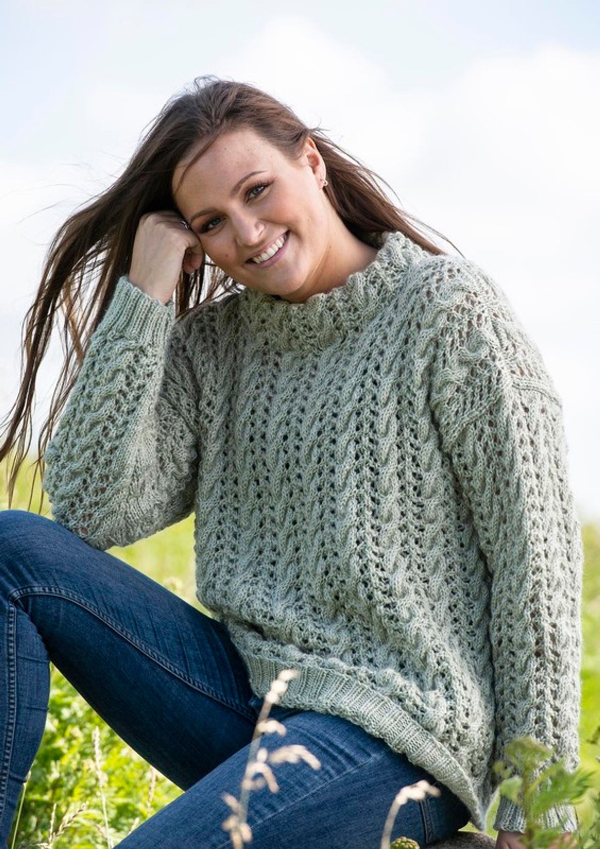 Sweater with lace pattern and cables 