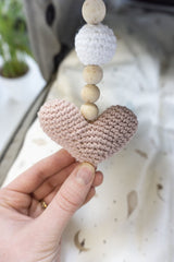 Crocheted stroller hanger with heart 